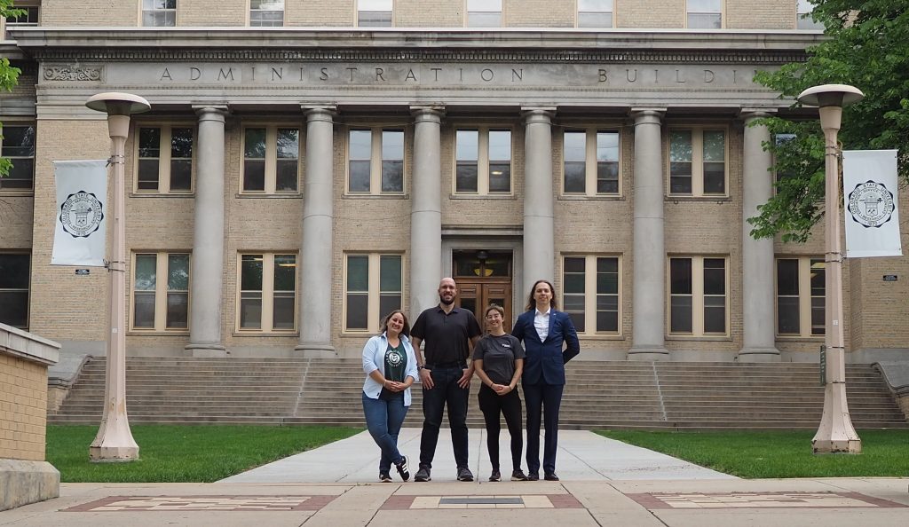 Photo of lab members taken June, 2025.